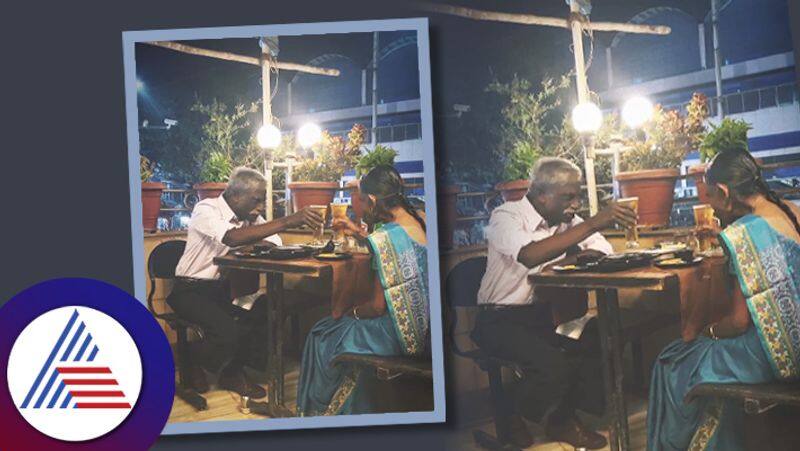 Elderly Couple Shares A Drink At Mumbai Eatery In Wholesome