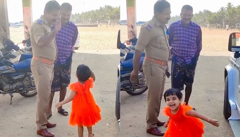 little girl salute police officer kerala police shares the video hyp 