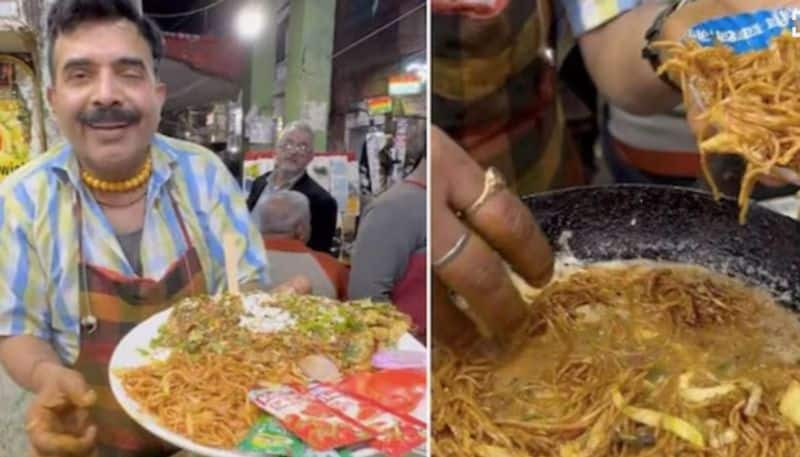 old delhi street vendor makes chowmein omelette azn