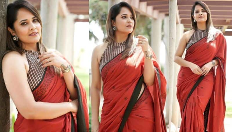 Actress Anasuya latest photoshoot in red saree NSK