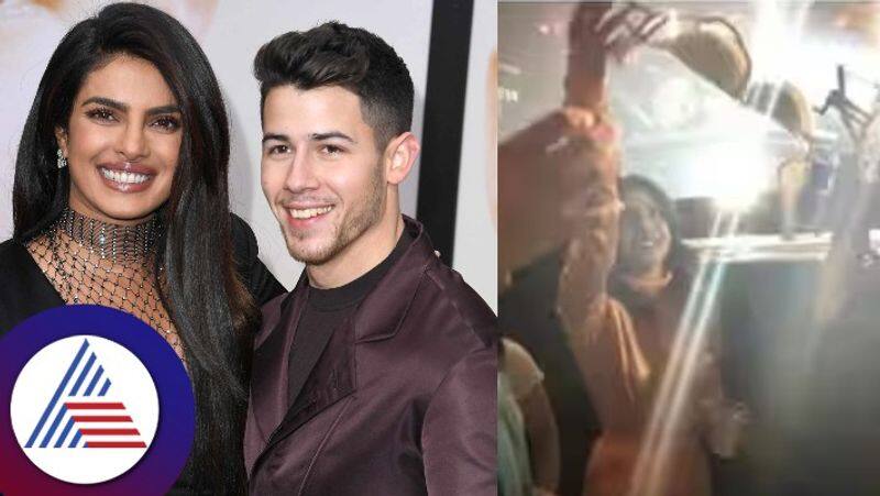 Bollywood Priyanka Chopra caught fan bra thrown at husband Nick Jonas in concert vcs 