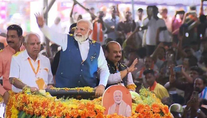 PM Modi slams Congress ask BJP workers for double engine government in Davanagere Vijaya sankalpa yatra ckm