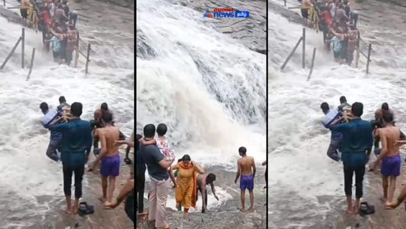 Tourists caught in a flood at Kumbakarai Falls! Viral video!