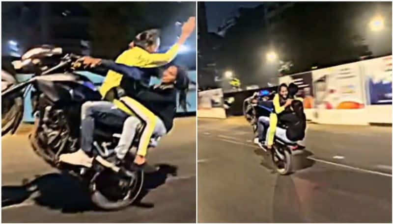 Mumbai Police book three youths  including 2 girls for performing Dangerous Bike Stunt prm 