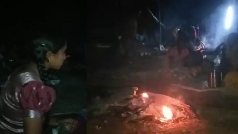 Tribal SSLC students studying under lamplight It is difficult to write the exam sat