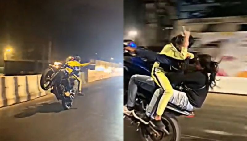 man performed bike stunt with women arrested hyp