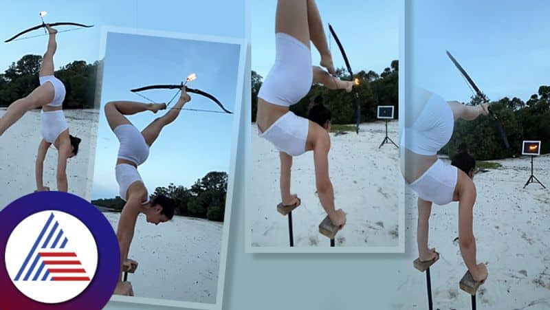 Gymnast girl shoots arrow with her feet toes, it takes 17 years training