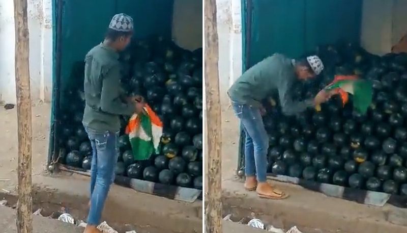 watch man shamelessly uses indian national flag to clean fruits in jhansi up police order probe ash