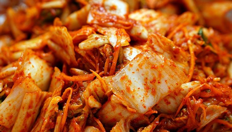 traditional food served in school food spreads  norovirus in south korea  food poisoning linked to kimchi