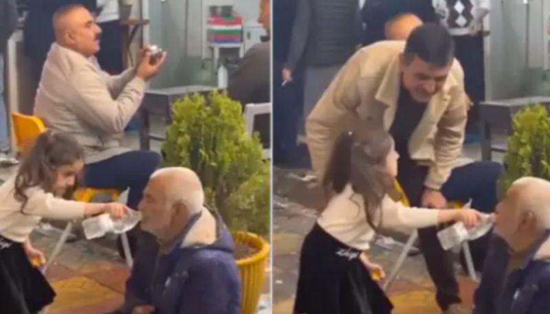 Viral Video Of Little Girl Helping Elderly Man Drink Water azn 