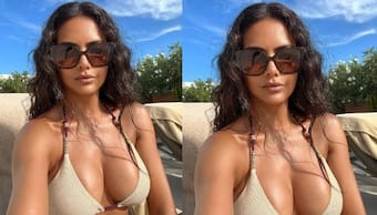 Esha Gupta suffers OOPS moment, gets trolled for going braless; netizens say 'ye ni***es dikha kar..." (WATCH)