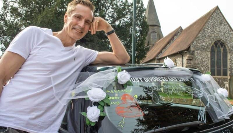 man drives car on which he wrote just divorced and loving it hyp 