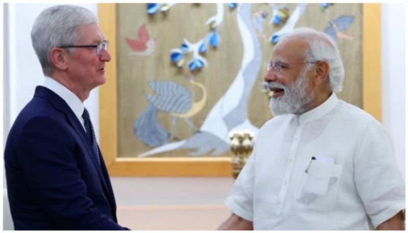 apple ceo timm cook tweeted a picture with narendra modi vcd