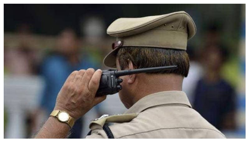 west bengal man went into classroom with gun and news paper, police took him into custody kms