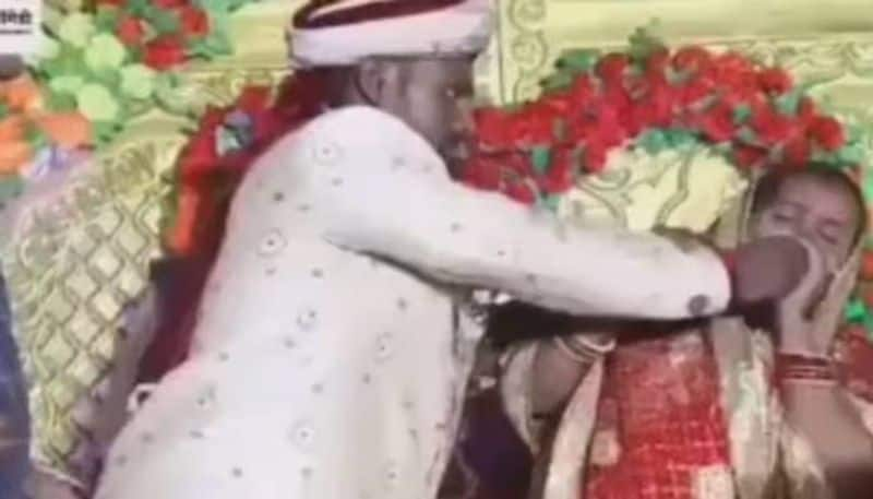 bride and groom slap each other in wedding stage rlp