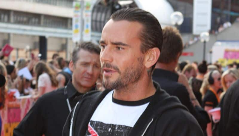 pro-wrestling WWE: Watch CM Punk spotted backstage on RAW; real reason for AEW star arrival revealed-ayh