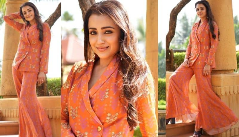 Actress Trisha Krishnan attracts in red outfit NSK