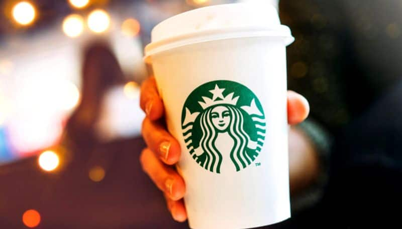 man orders coffee from zomato while sitting in starbucks to save money ash