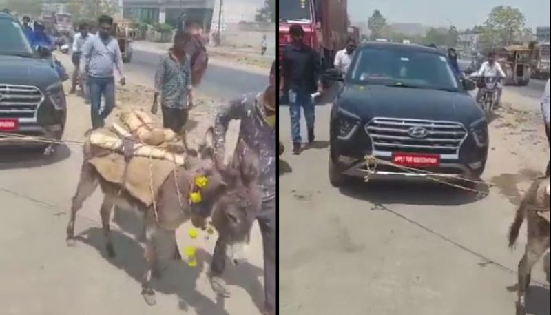 man drags newly purchased car with donkey after repeated break downs etj