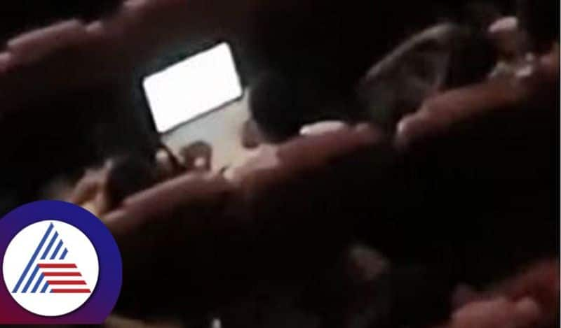 this can only happen in bengaluru man works on laptop inside a movie theatre ash