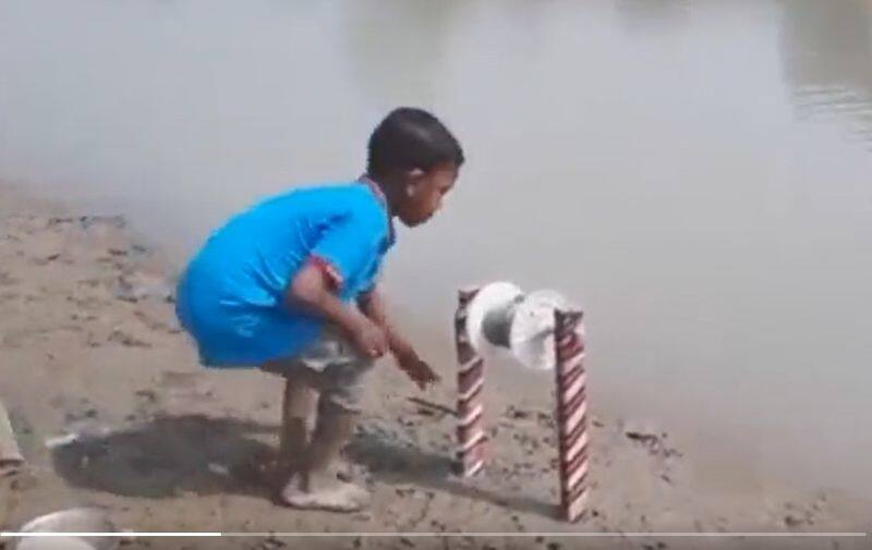 Little boy's technique of catching fish has bowled the Internet over. Video is viral rsl