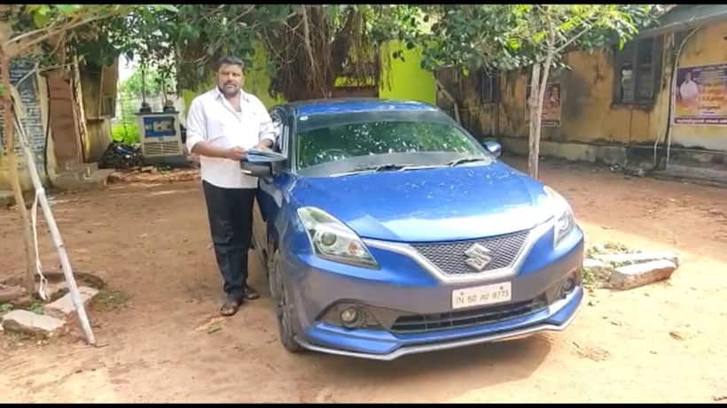 சொகுசு காரில் சென்றவருக்கு தலை கவசம் அணியவில்லை என அபராதம் விதித்த காவல்துறை