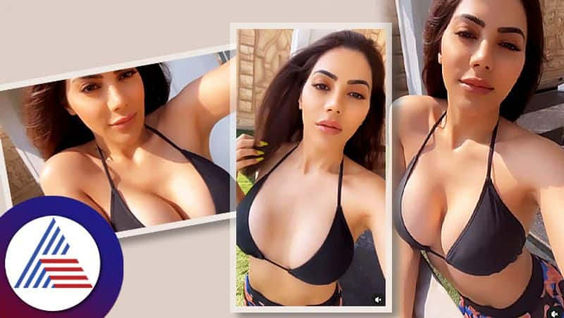 Nikki Tamboli lights up internet in sexy backless bikini top on cot