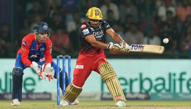 virat kohli and maipal lomror half centuries help rcb to set tough target to delhi capitals in ipl 2023