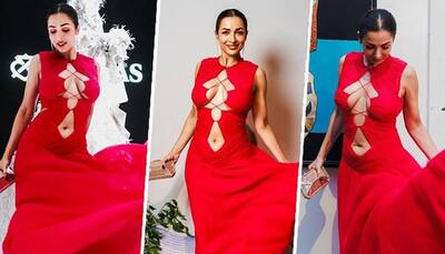 Malaika Arora HOT Photos: Bollywood diva flaunts hourglass figure in bold red criss-cross pattern gown