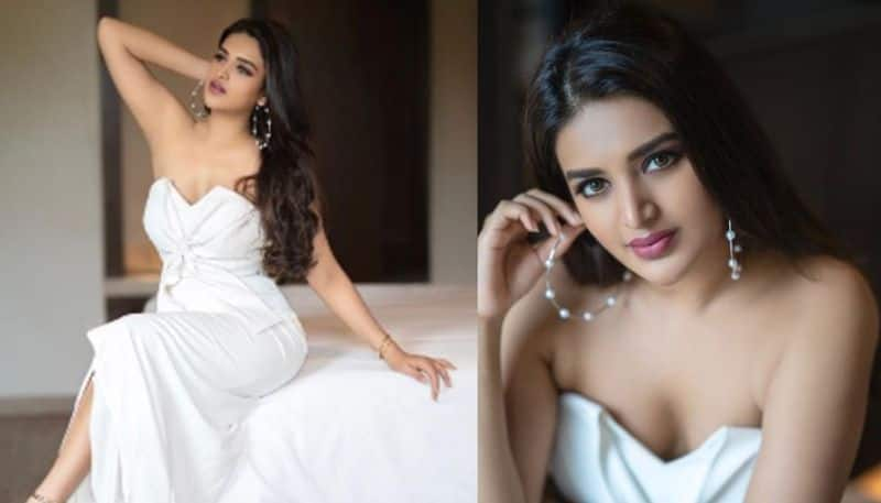 Actress Nidhhi Agerwal beautiful  look in White dress NSK