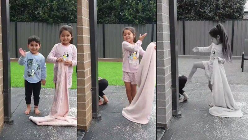 Little girl tries to show a magic trick in viral video. But her brother steals the show akb