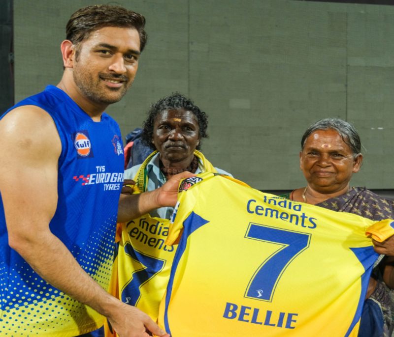 Dhoni hands CSK jerseys to elephant whispers bomman and bellie saa