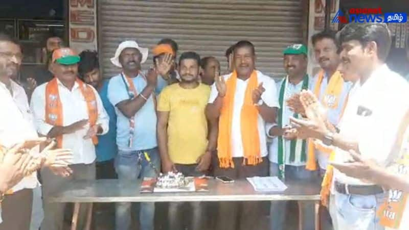 The birthday of BJP Candidate Poornesh was celebrated by all party activists outside the polling booth