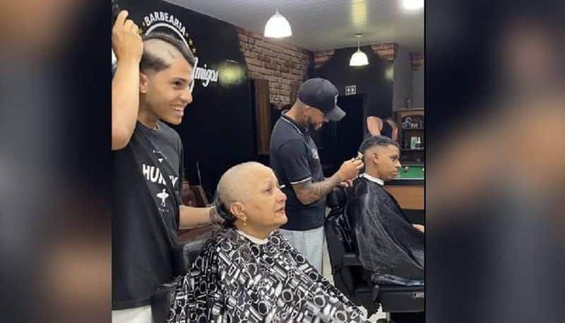 mother fighting cancer barber shaves his own head to support rlp