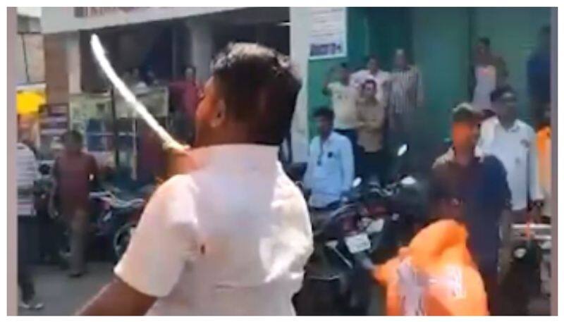 Man walk on road in vijayapura with sword in hand video viral nbn