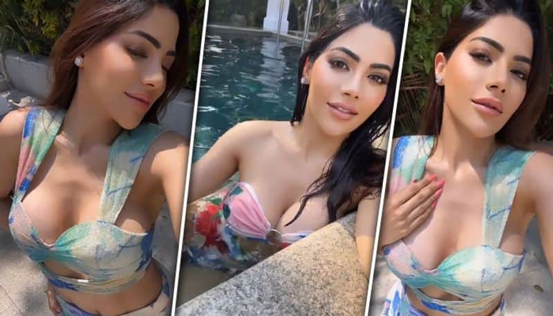 Nikki Tamboli HOT Photos: Actress flaunts luscious curves in colourful cut-out top, sexy bikini (PICTURES) vma