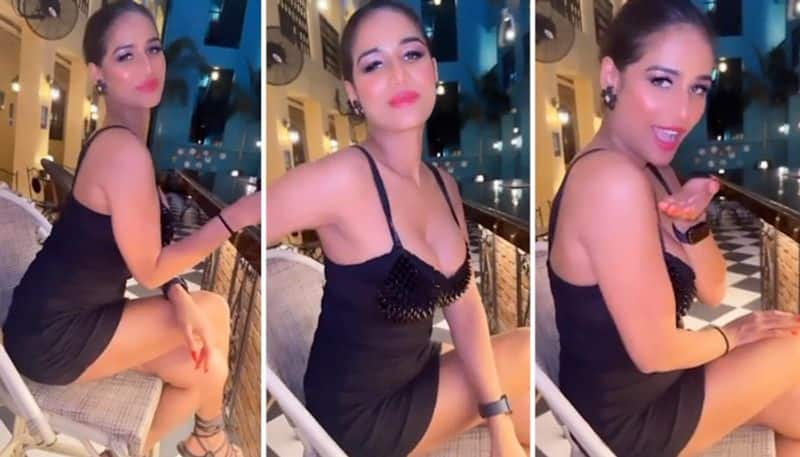 Poonam Pandey SEXY Photos: Actress shows luscious curves in black cleavage-baring short dress vma