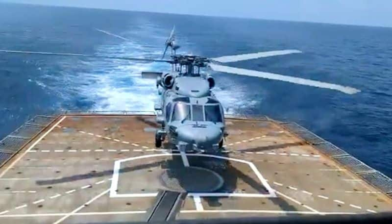 MH60R chopper Romeo undertakes maiden sea landing on INS Kolkata to boost India's anti-submarine warfare capability snt