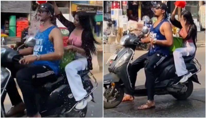 couple bathing riding scooter viral video police response btb