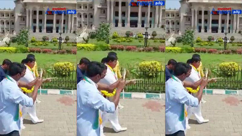 Congress workers purifying sprinkle cow urine and perform pooja at the assembly building