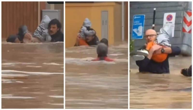 video of mother screamed to save her baby from the flood waters and the rescue operation went viral bkg 