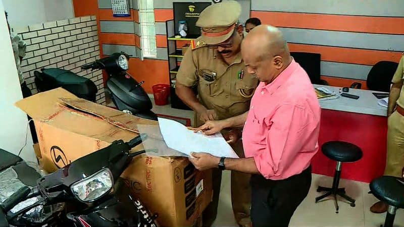 MVD raid at electric vehicle showroom in kerala kgn