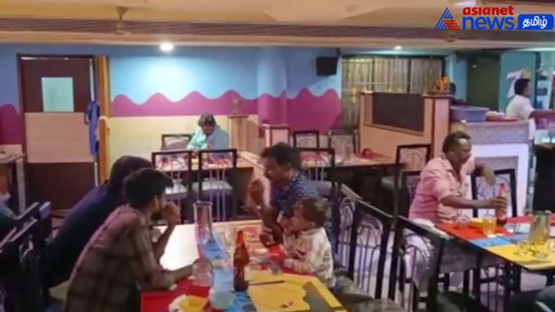 Shocking scene of a 4-year-old child sitting with people drinking alcohol in a private hotel!