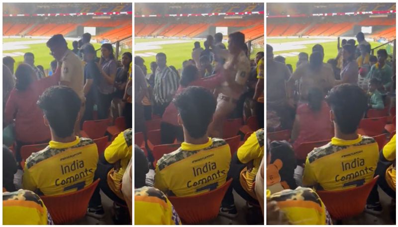 watch video lady cricket fan push police officer in ahmedabad Narendra modi stadium saa