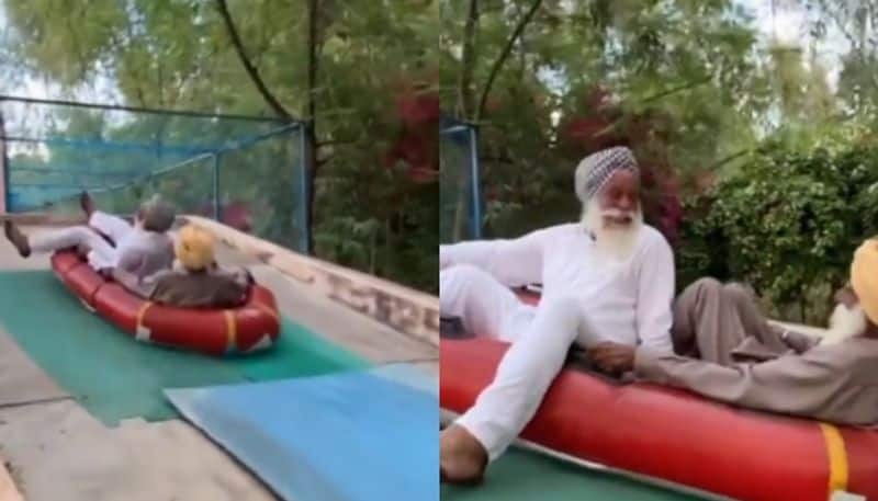 old men enjoying in water slide the video going viral hyp 