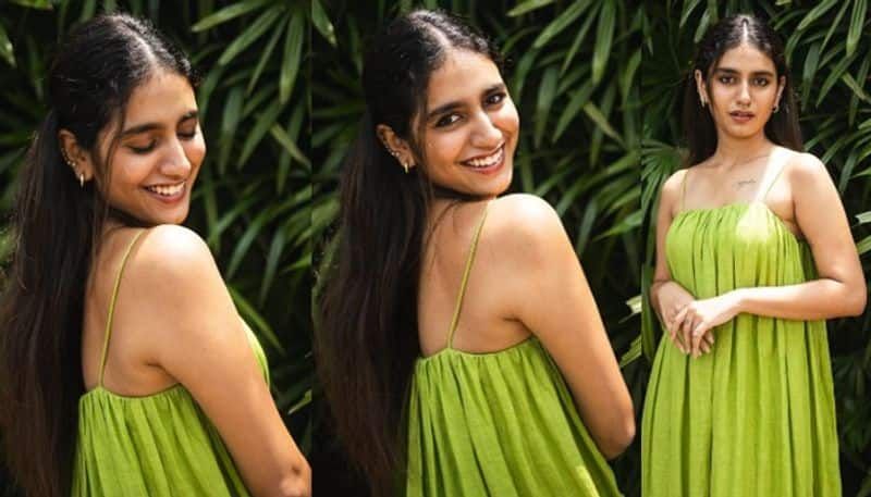 Actress Priya Prakash Varrier beautiful look in green gown NSK