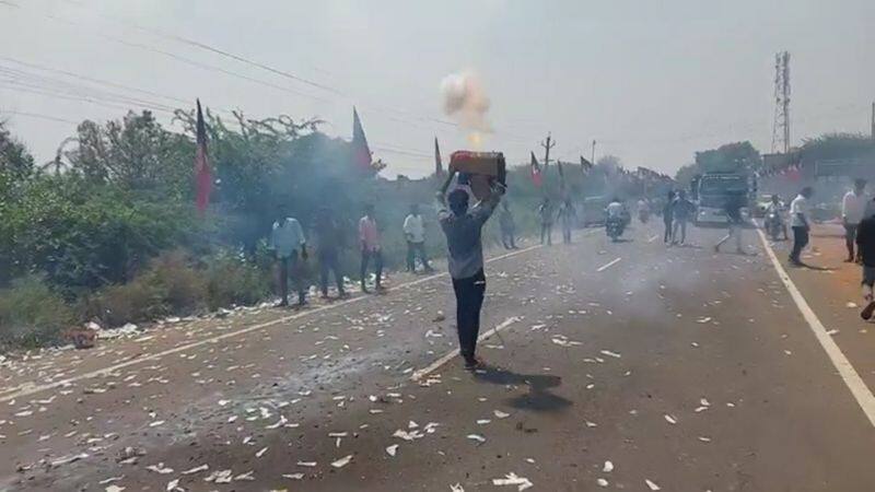 In Madurai, youths burst firecrackers on the road causing heavy traffic congestion