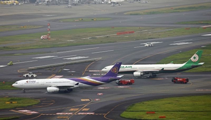 Two planes Thai airways and Taiwan's Eva airways collide on ground at Tokyo's Haneda airport; Passengers safe anr