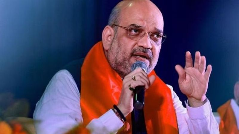 Union minister Amit shah says UPA involved in 12,000 lakh crore scam