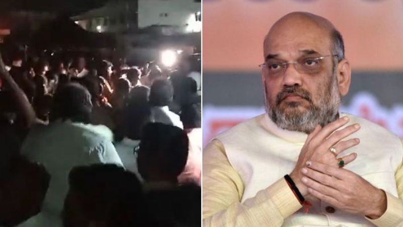 Amit Shah met the volunteers BJP members jumped on the road block due to power cut